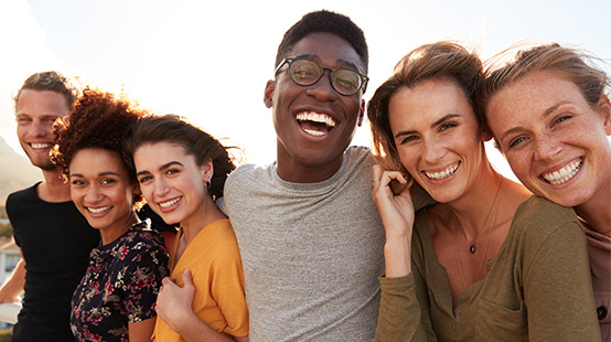 Smiling group of multi-ethnic friends.