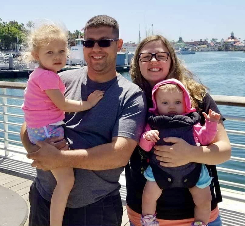 Megan Gibbons with her husband and children.