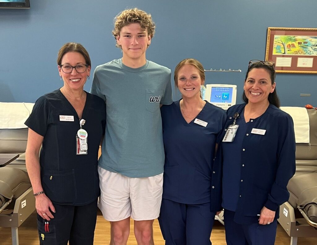 Platelet donor Dylan Tallardy, and RIBC staff