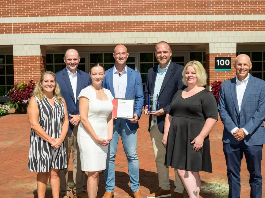 RIBC and Amica executives celebrate